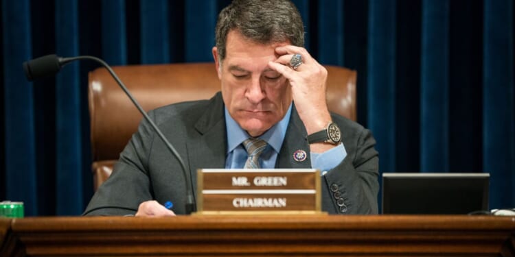 Rep. Mark Green prepares before the start of a House Homeland Security Committee hearing, titled "Havoc in the Heartland: How Secretary Mayorkas' Failed Leadership Has Impacted the States," at the U.S. Capitol in Washington, D.C., on Jan. 10.