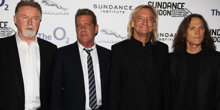 Musicians Don Henley, left, Glenn Frey, Joe Walsh and Timothy B. Schmit of The Eagles attend "History Of The Eagles Part One" screening in London in a file photo from 2013.