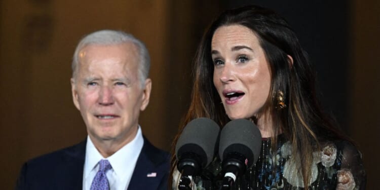 President Joe Biden looks on as his daughter Ashley Biden speaks during a Juneteenth concert on the South Lawn of the White House in Washington on June 13, 2023.