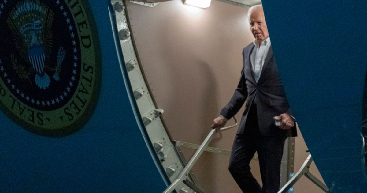 President Joe Biden walks down the ramp of Air Force One as he arrives at Andrews Air Force Base, Maryland, on Thursday.