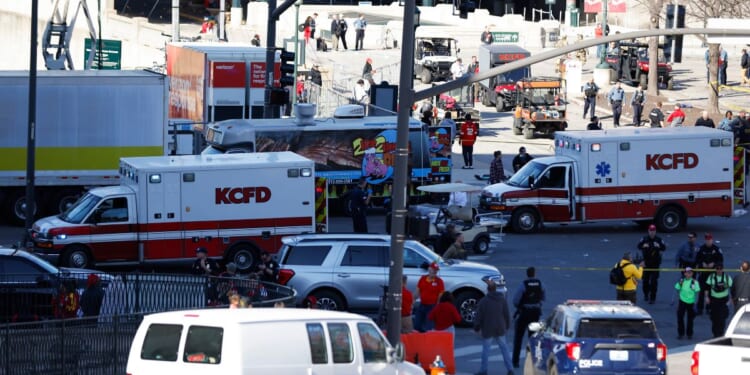 Law enforcement and medical personnel respond to a shooting at Union Station during the Kansas City Chiefs' Super Bowl victory parade in Kansas City on Wednesday.