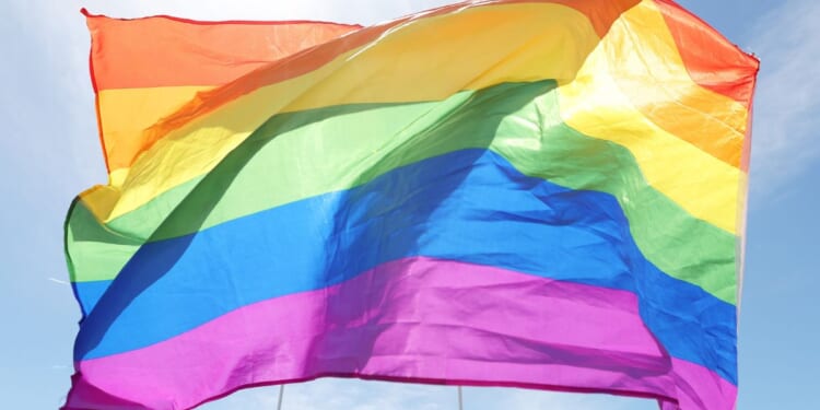 An LGBT "pride" flag is seen before a game at Henson Park in Sydney on Oct. 29.