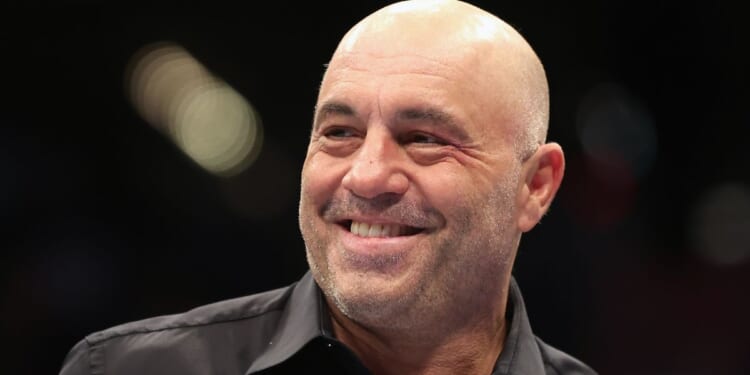 Color commentator Joe Rogan looks on during UFC 274 at Footprint Center in Phoenix on May 7, 2022.