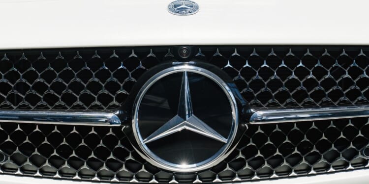 A stock photo shows the grill of a white Mercedes CLS in Rostov-on-Don, Russia, on May 7, 2022.