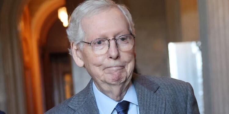 Senate Minority Leader Mitch McConnell arrives for a Senate Republican meeting at the U.S. Capitol in Washington, D.C., on Thursday.