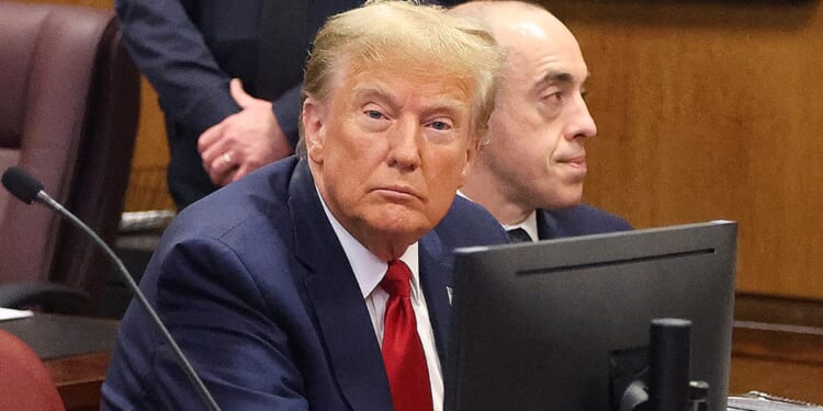 Former President Donald Trump awaits the start of a hearing in New York City Criminal Court on Thursday.