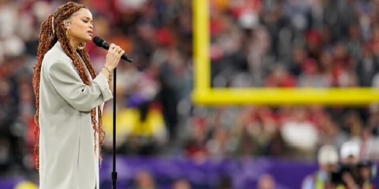 Singer Andra Day performs "Lift Every Voice and Sing" -- known as the "Black National Anthem" -- prior to Sunday's Super Bowl LVIII in Las Vegas.