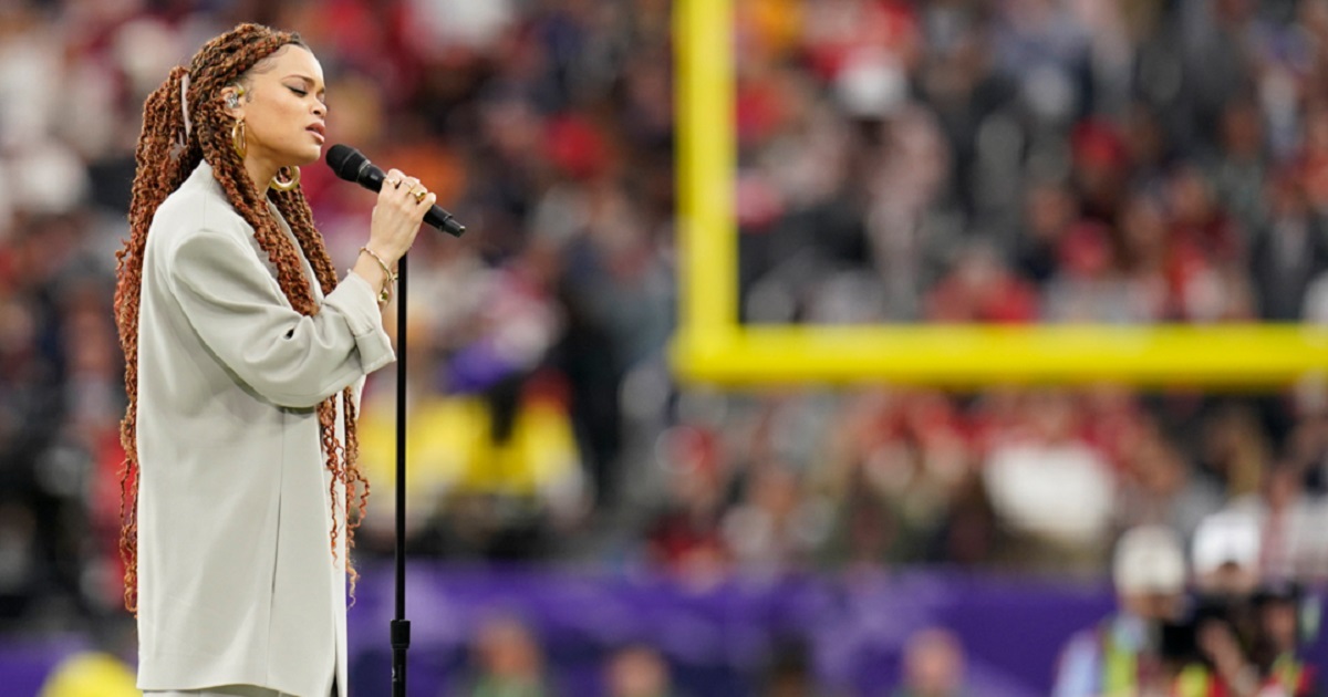 Singer Andra Day performs "Lift Every Voice and Sing" -- known as the "Black National Anthem" -- prior to Sunday's Super Bowl LVIII in Las Vegas.