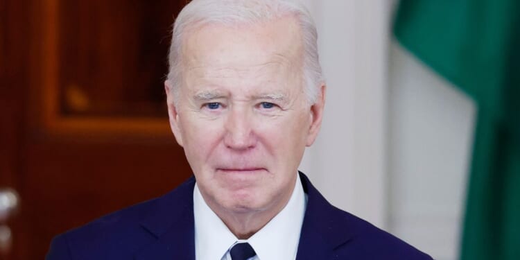 President Joe Biden listens as King of Jordan Abdullah II ibn Al Hussein speaks at the White House in Washington, D.C., on Monday.