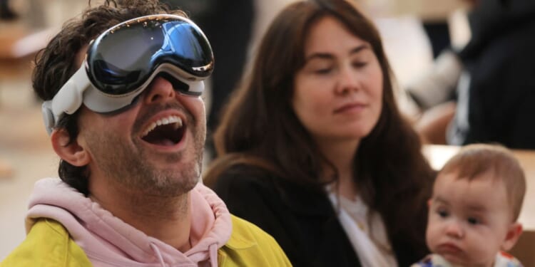 A customer tries the Apple Vision Pro during the product's launch at Apple The Grove in Los Angeles on Friday.