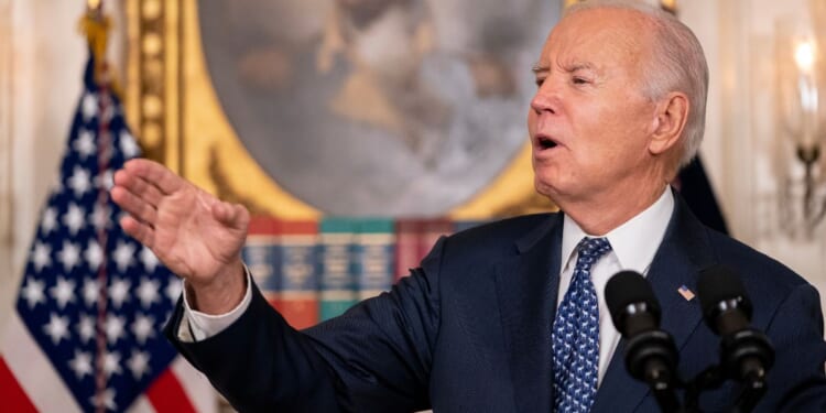 President Joe Biden speaks in the Diplomatic Reception Room of the White House in Washington on Thursday.