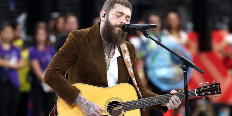 Post Malone performs “America the Beautiful” during the Super Bowl LVIII pregame in Las Vegas on Sunday.