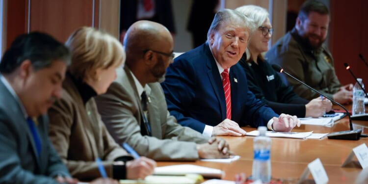 Republican presidential candidate and former President Donald Trump meets with leaders of the International Brotherhood of Teamsters at their headquarters in Washington on Jan. 31.