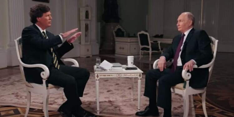 Tucker Carlson interviewing Vladimir Putin