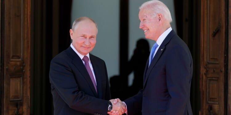 President Joe Biden and Russian President Vladimir Putin shaking hands in Switzerland