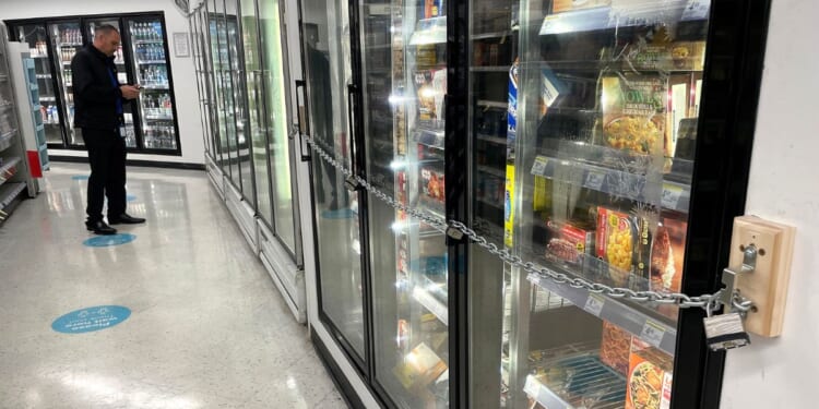 A padlock and chain secure freezer doors in a Walgreens in San Francisco, California, on July 18.