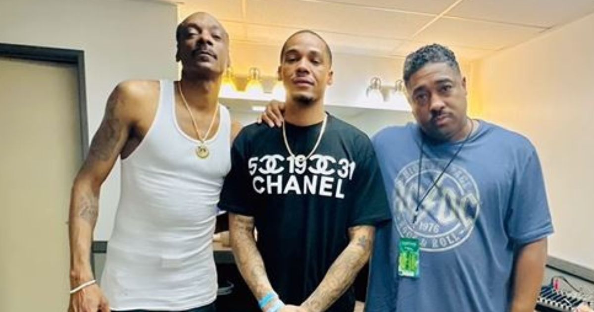 Hip-hop star Snoop Dogg (left) reported Friday on Instagram that his brother, Bing Worthington, (right) has died. The man in the middle is unidentified.