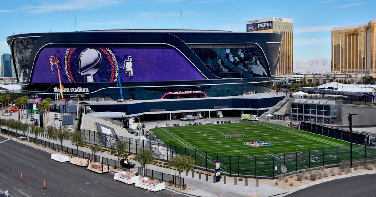 Workers prepare the field Wednesday at Allegiant Stadium in Las Vegas, ahead of Super Bowl 58.