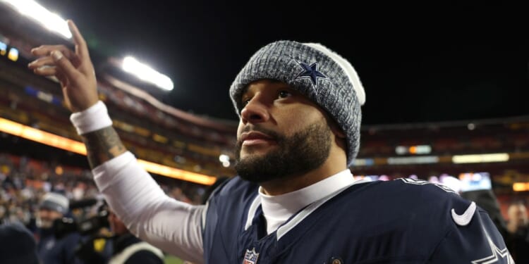 Dak Prescott of the Dallas Cowboys waves to fans after the game against the Washington Commanders in Landover, Maryland on Jan. 7.