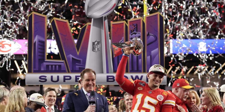 Kansas City Chiefs quarterback Patrick Mahomes, right, celebrates after winning Super Bowl LVIII over the San Francisco 49ers in Las Vegas, Nevada, on Sunday.