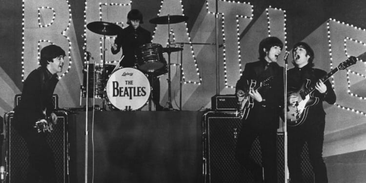 The Beatles -- Paul McCartney, Ringo Starr, George Harrison and John Lennon -- performing in Tokyo, Japan, in 1966.