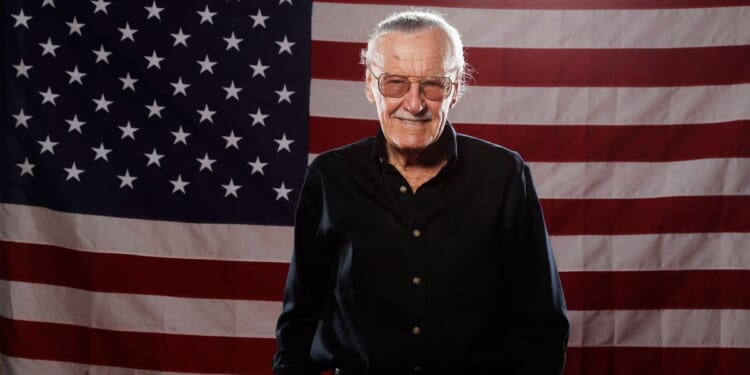 Comic book icon Stan Lee in front of an American flag at the LMT Music Lodge in San Diego in 2011.