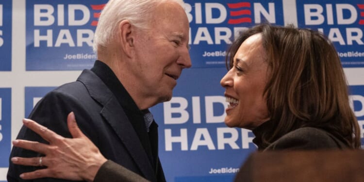 President Joe Biden greets Vice President Kamala Harris at his 2024 campaign headquarters on Feb. 3 in Wilmington, Delaware.