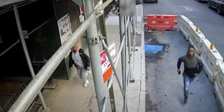 Two thieves were sent running by a brave New York City doorman on Sunday.