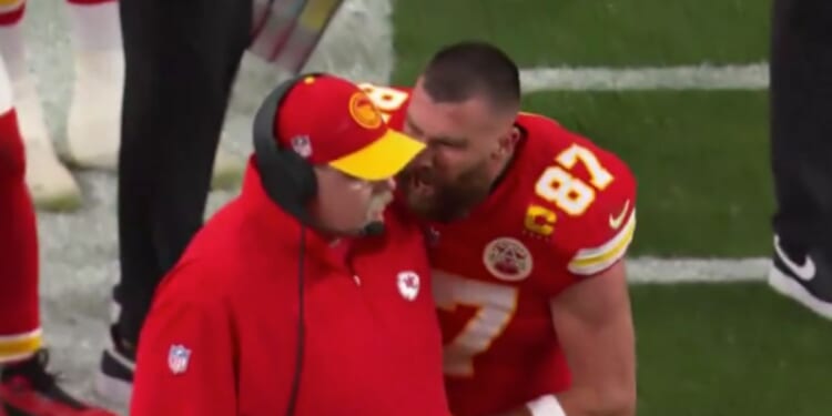 Kansas City Chiefs tight end Travis Kelce, right, yells and shoves head coach Andy Reid on the sideline during Super Bowl LVIII in Las Vegas, Nevada, on Sunday.