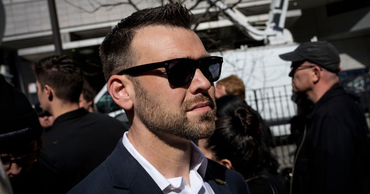 Jack Posobiec arrives to gather with supporters of former President Donald Trump outside the New York courthouse where Trump was arraigned on April 4.