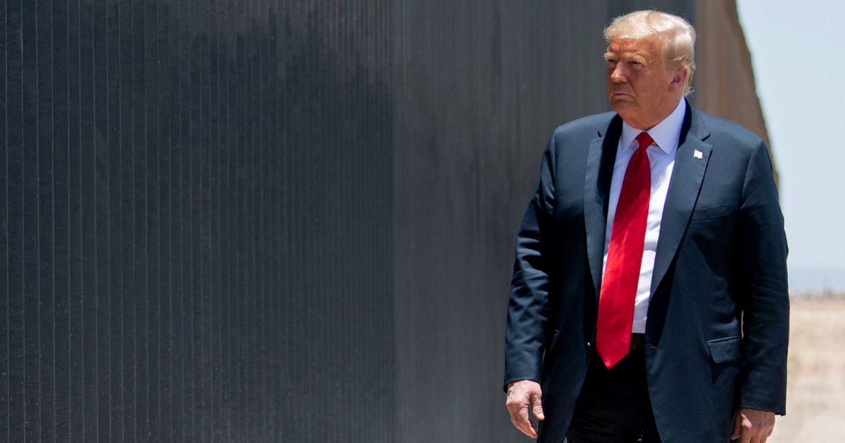 Then-President Donald Trump participates in a ceremony commemorating the 200th mile of border wall at the international border with Mexico in San Luis, Arizona, on June 23, 2020.