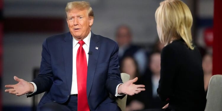 Donald Trump speaking during a town hall in Greenville, South Carolina, with moderator Laura Ingraham