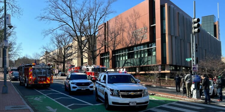 Secret Service vehicles block access to a street leading to the Embassy of Israel in Washington on Sunday.