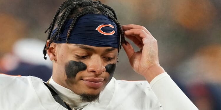 Justin Fields of the Chicago Bears reacts on the sideline in the second half against the Green Bay Packers at Lambeau Field on Jan. 7 in Green Bay, Wisconsin.