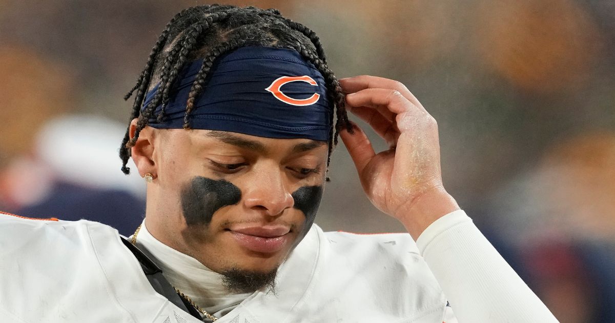 Justin Fields of the Chicago Bears reacts on the sideline in the second half against the Green Bay Packers at Lambeau Field on Jan. 7 in Green Bay, Wisconsin.