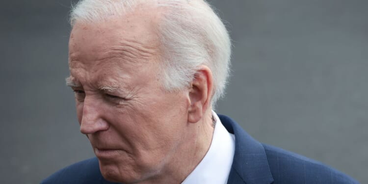 President Joe Biden answers questions while departing the White House in Washington, D.C, on Tuesday.