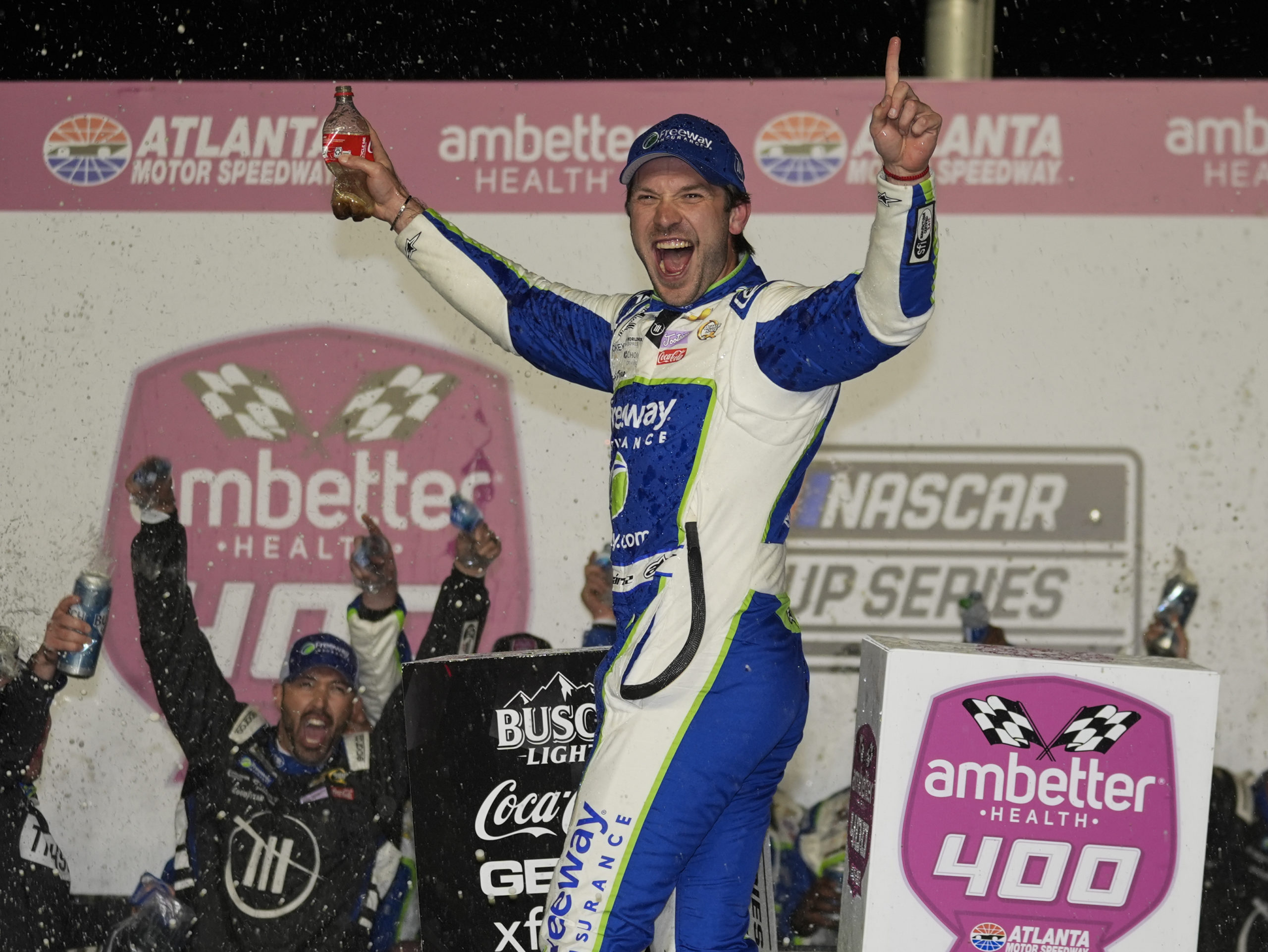 Daniel Suarez celebrates after winning the NASCAR auto race at Atlanta Motor Speedway in Hampton, Georgia, on Sunday.