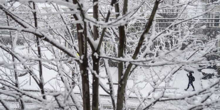 Winter storm hits parts of Northeast, causing difficult driving, closed schools and canceled flights