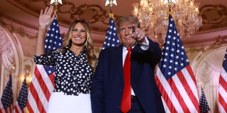 Former first lady Melania Trump, left, and Former President Donald Trump, right, stand together during an event at his Mar-a-Lago home in Palm Beach, Florida, on Nov. 15, 2022.