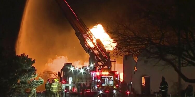 Industrial fire, multiple explosions shoot debris into the air in Detroit suburb