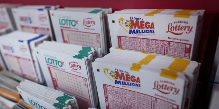 Mega Millions jackpot jumps to $735 million, would be sixth-largest prize in lottery's history