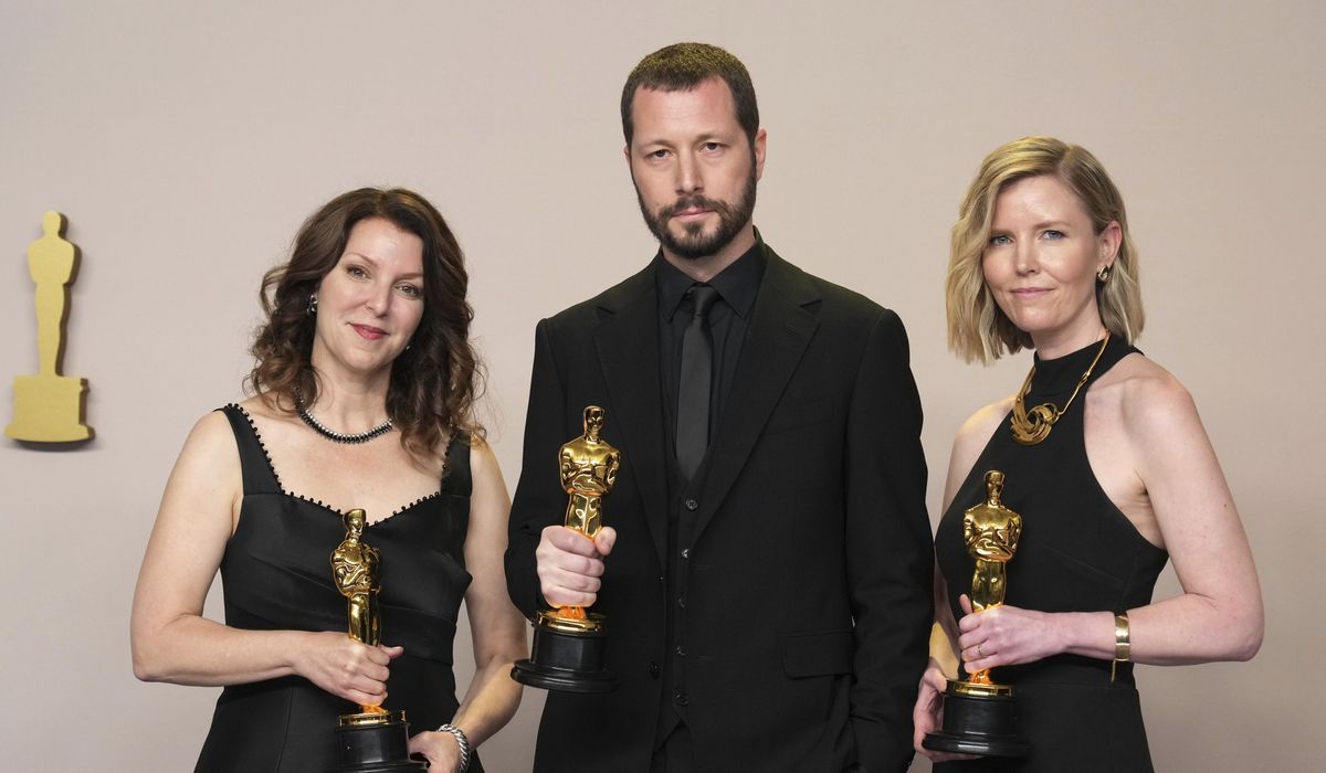 Ukraine's 1st Oscar hailed as reminder of war's horrors as Russian drones strike buildings