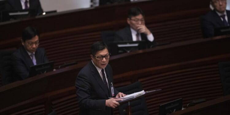 Hong Kong lawmakers unanimously approve law that gives government more power to curb dissent