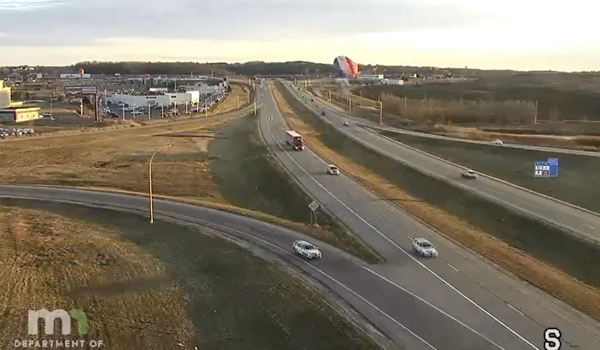 A hot air balloon crashed into a power line and caused a fire, but everyone is O.K.