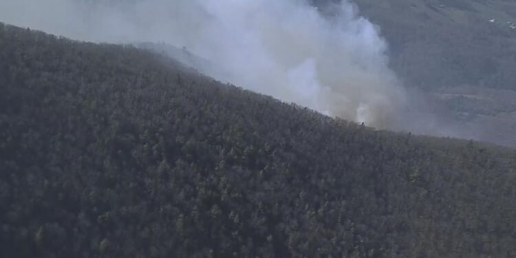 Rain helps contain still-burning wildfires in Virginia's Shenandoah Valley; state sending more aid