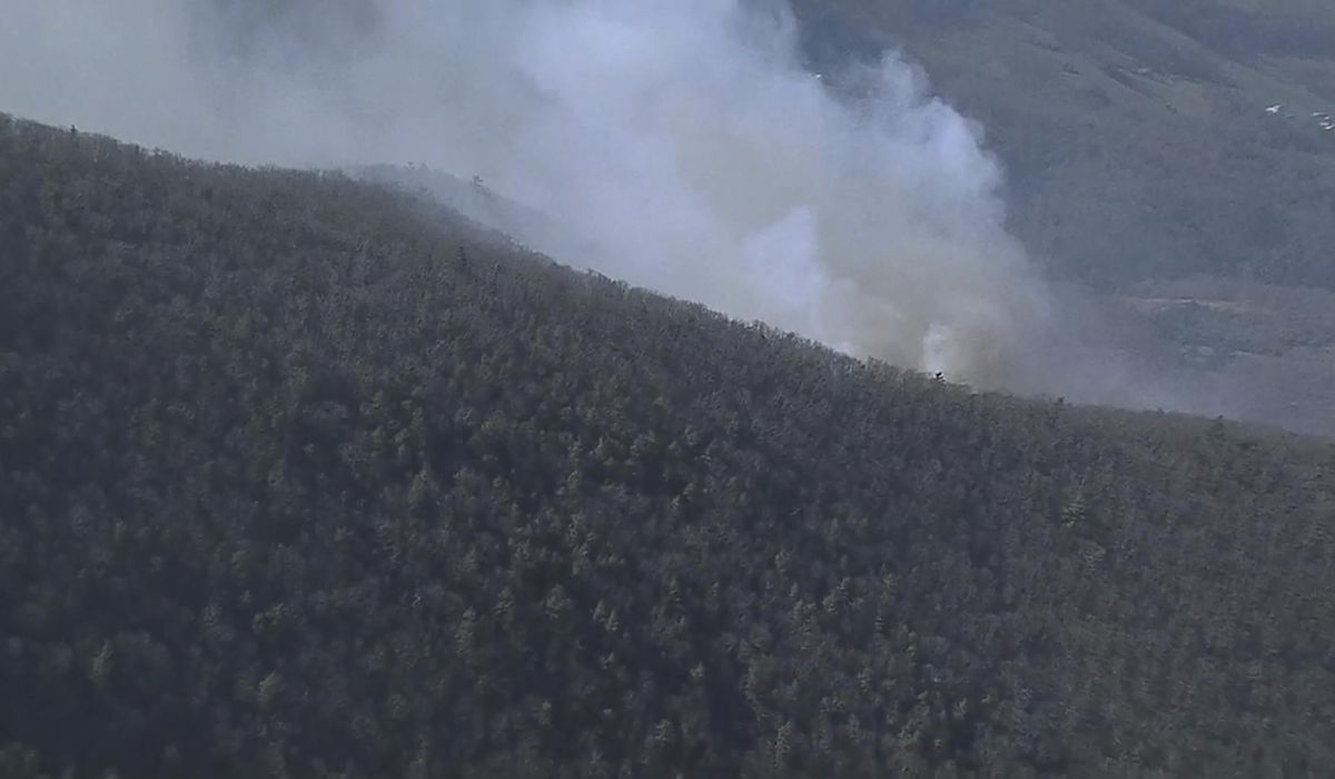 Rain helps contain still-burning wildfires in Virginia's Shenandoah Valley; state sending more aid