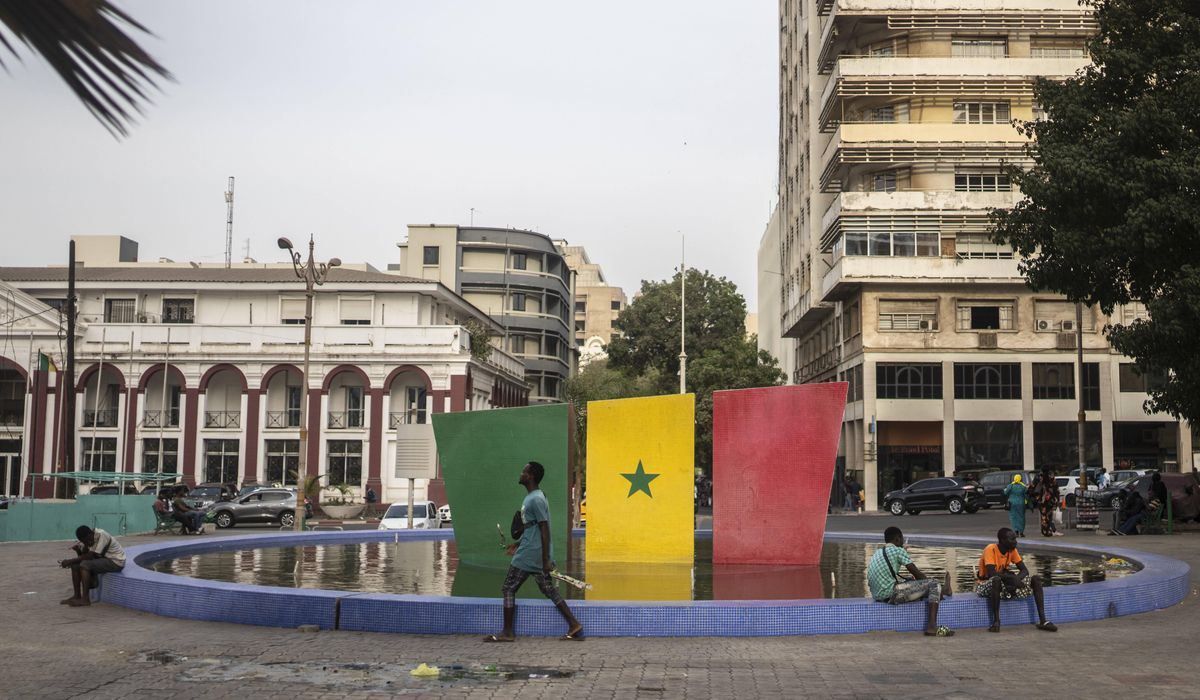 Senegal votes in a tightly contested presidential race after months of unrest