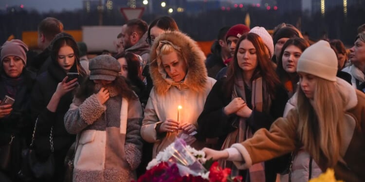 As Russia mourns concert hall attack, some families are wondering if their loved ones are alive