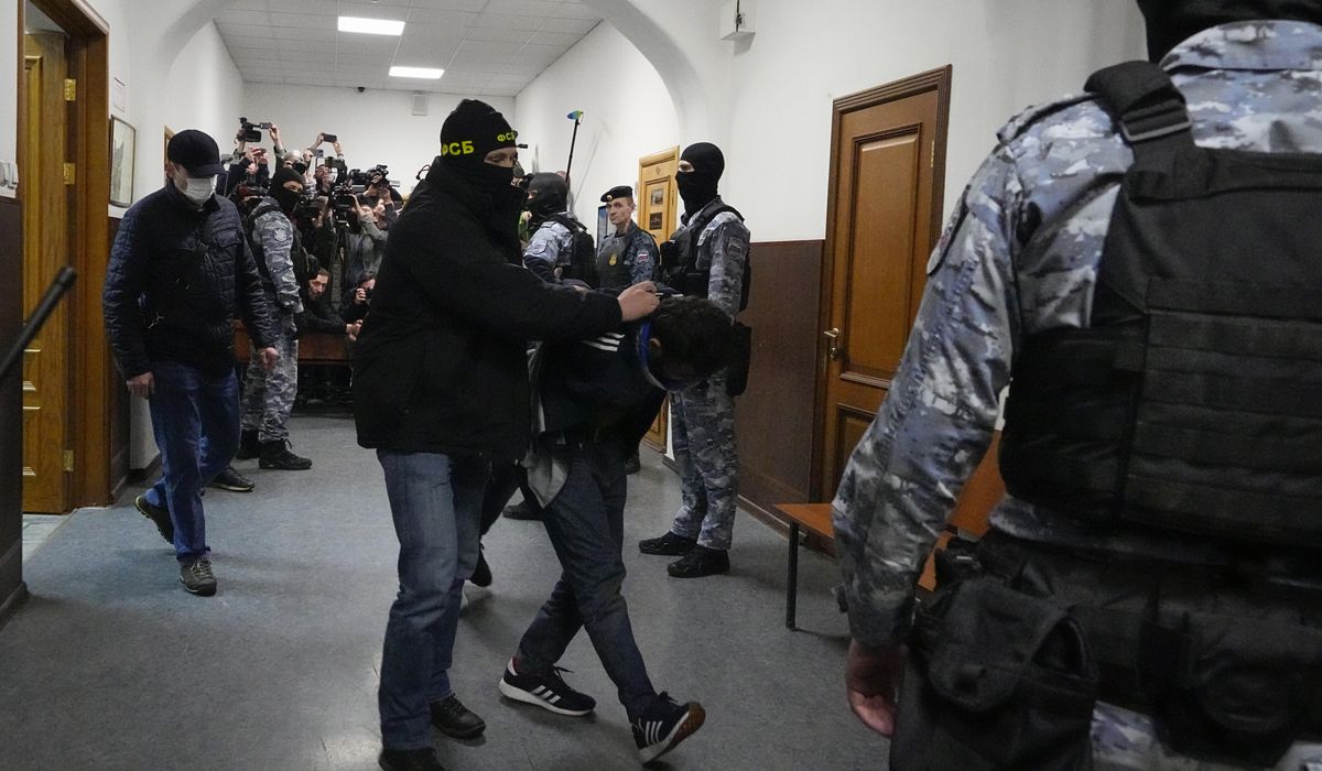 Russia concert hall attack suspects appear in a Moscow courtroom