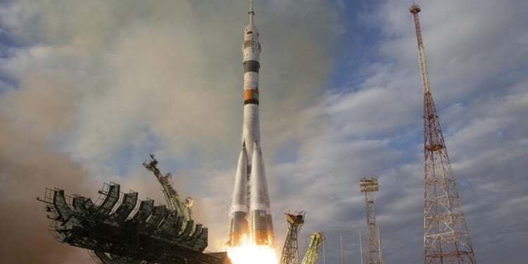 Russia's Soyuz spacecraft with 3 astronauts docks at the International Space Station